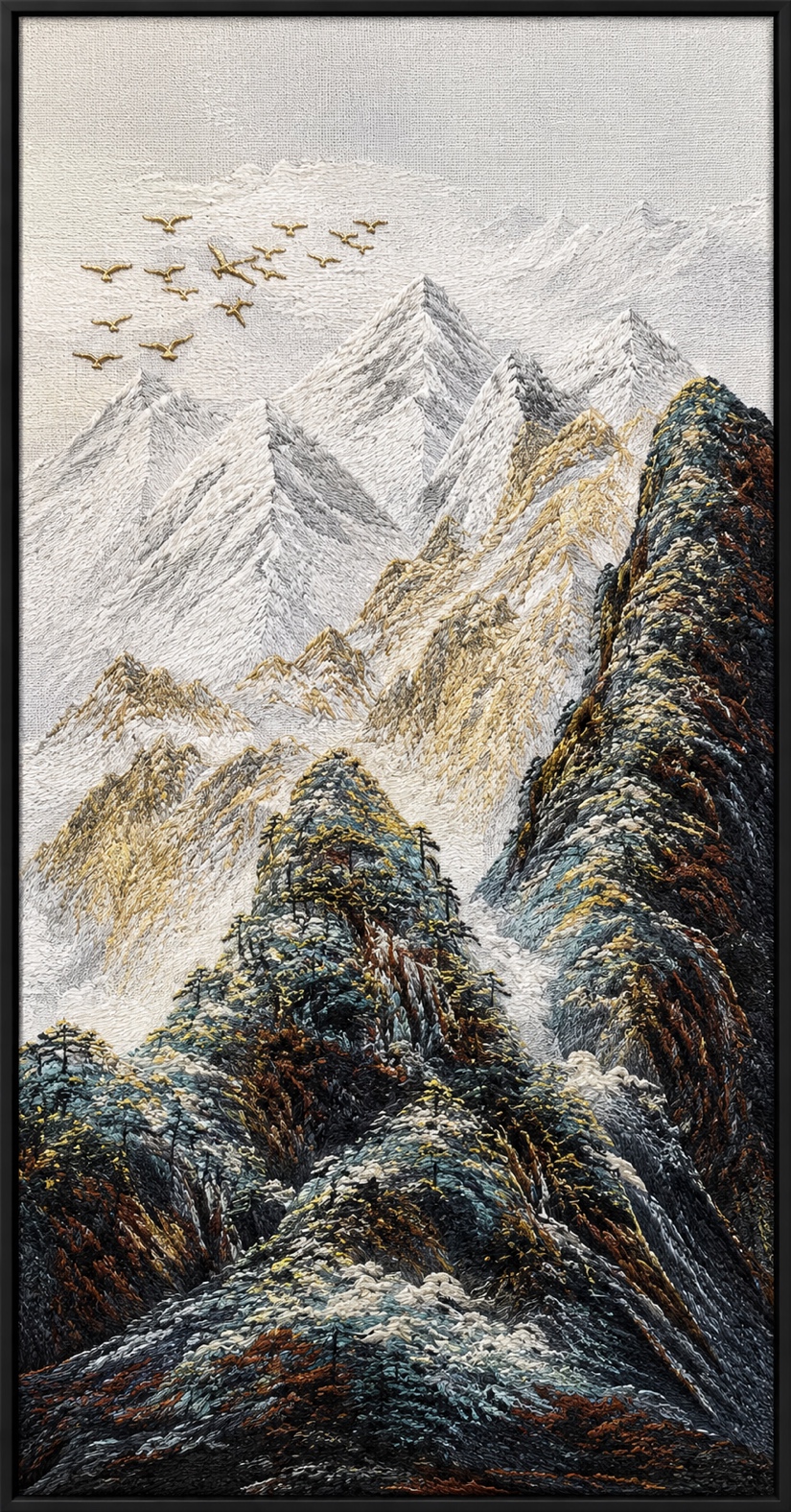 Landscape textile artwork with mountains and birds
